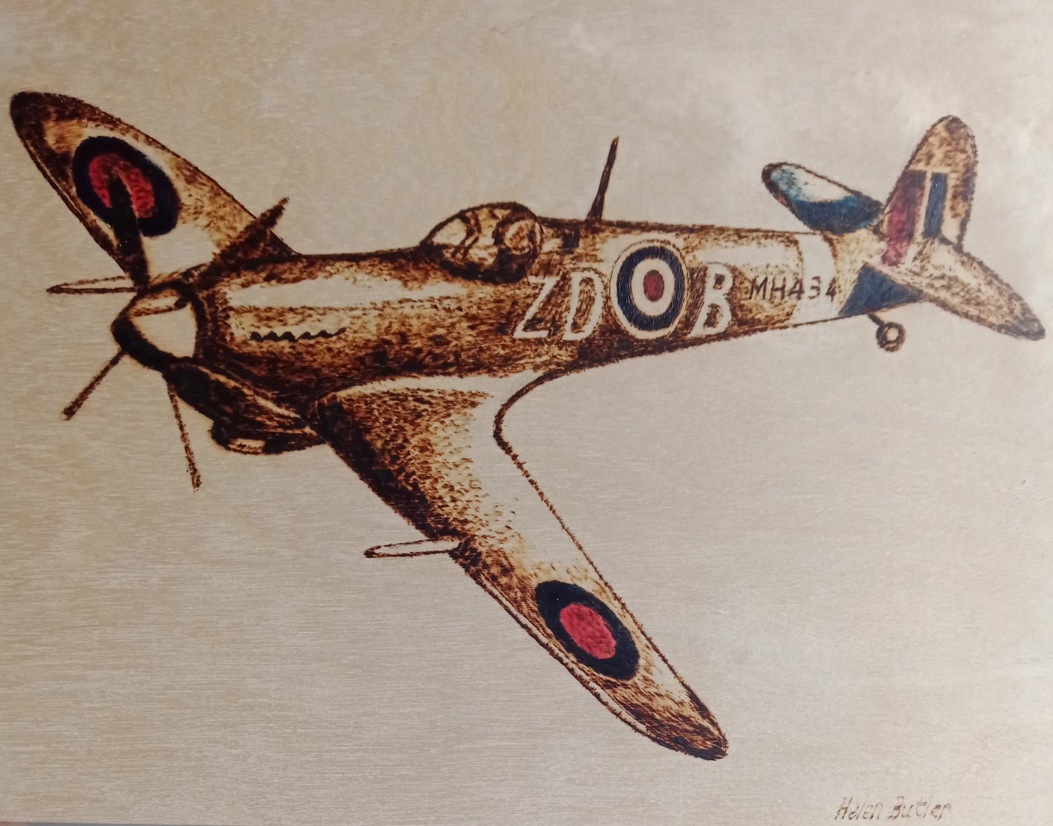 Spitfire - pyrography and paint