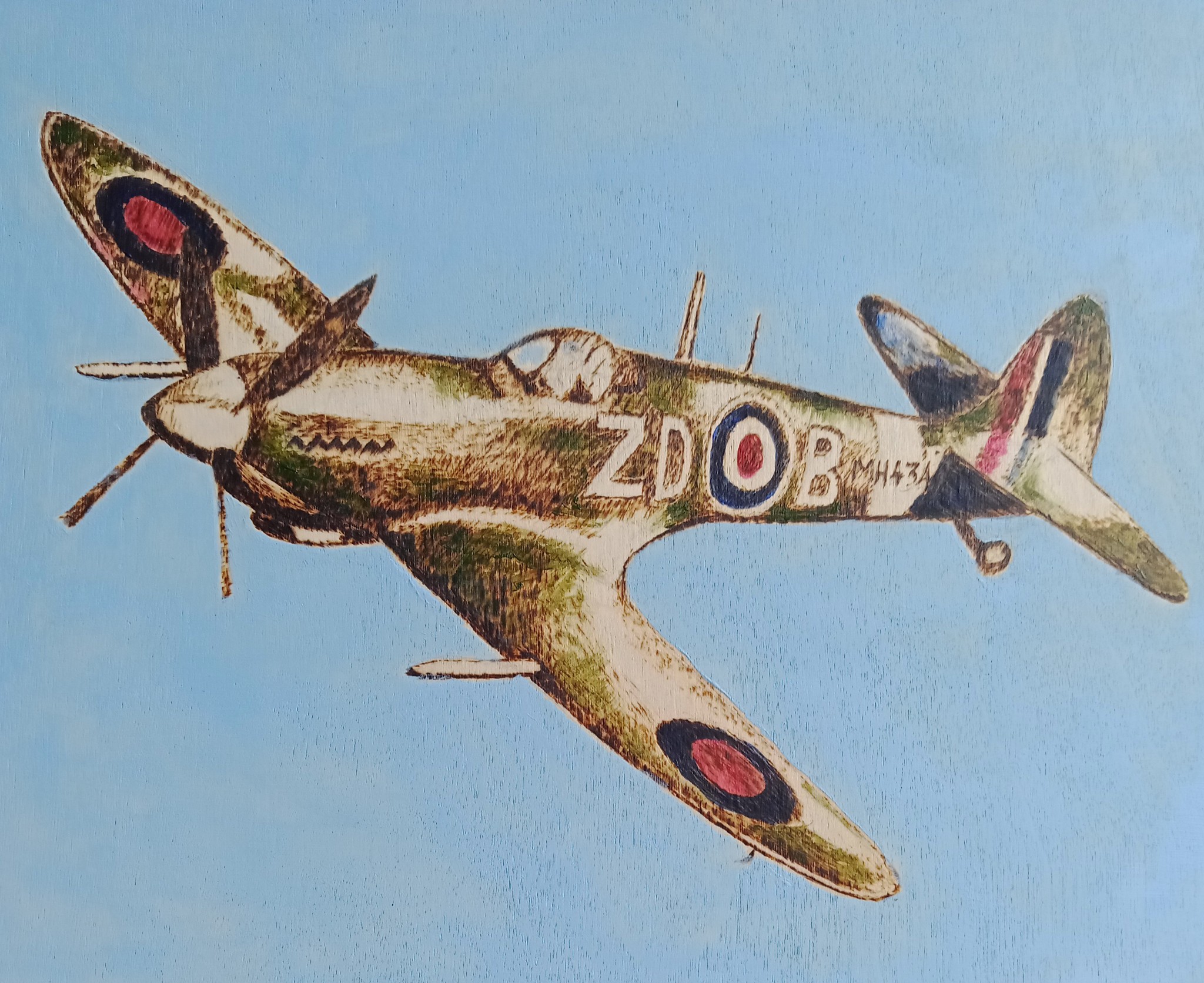Spitfire pyrography and paint