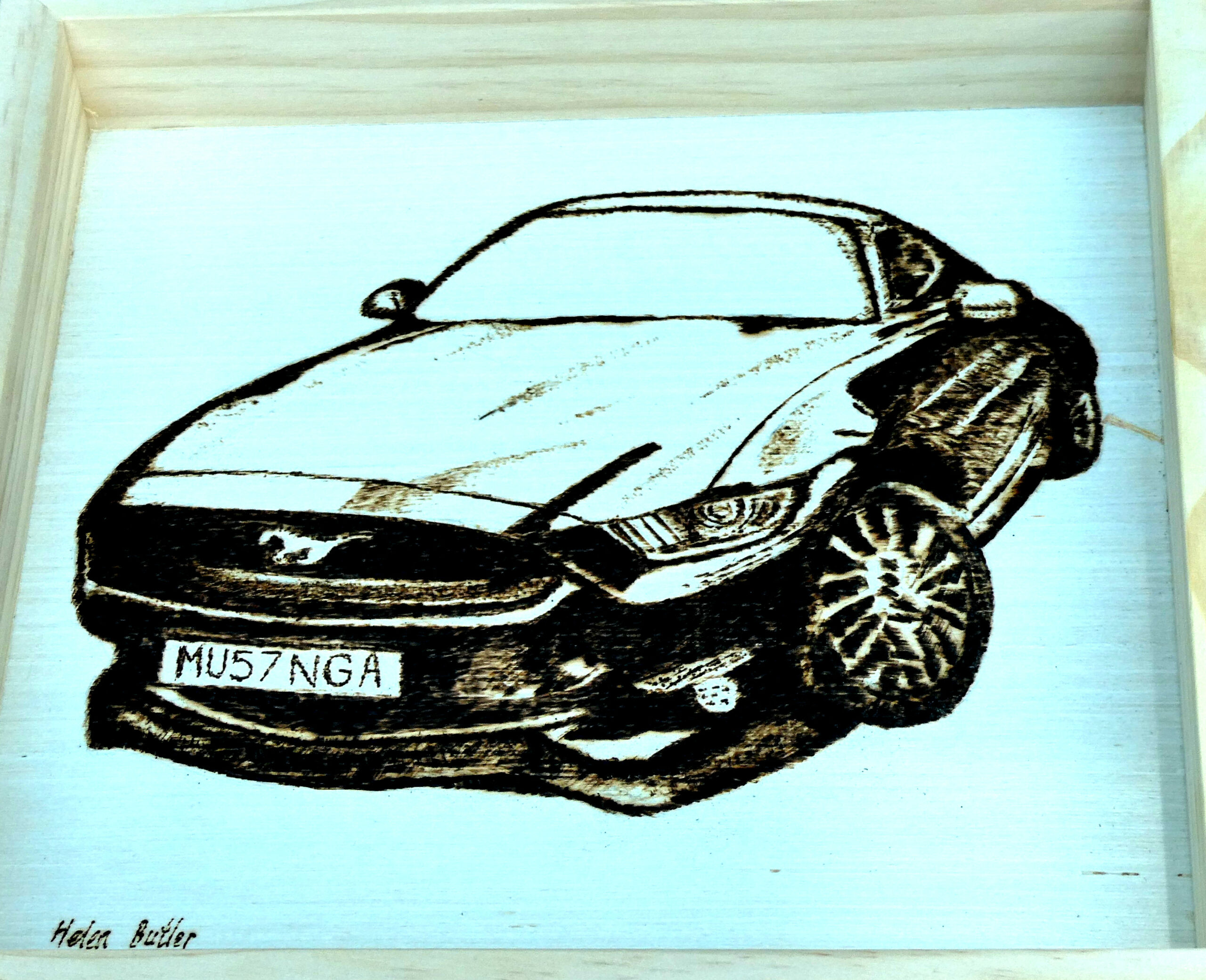Mustang pyrography on wood panel